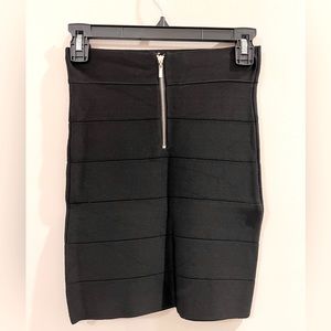 Bebe body con skirt with gold zipper detail in back